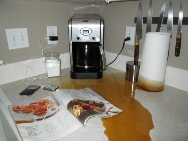Why is my Cuisinart coffee center leaking water from the bottom?