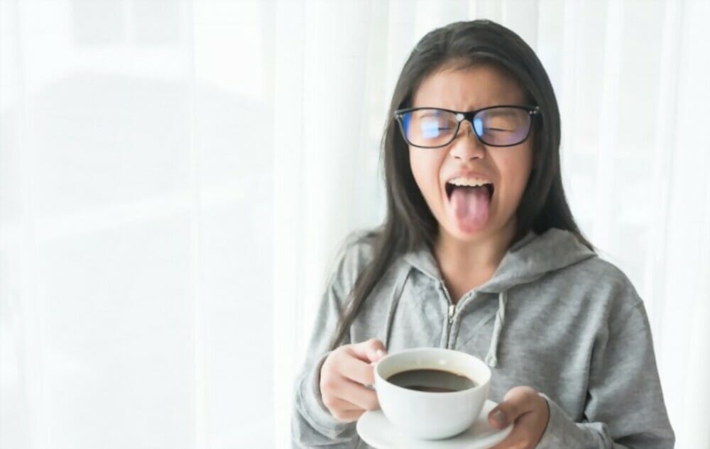 Is decaf coffee less acidic than regular coffee?